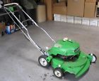 8238 Older Push Style Lawn Mower In