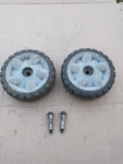 Lawn-boy 10604 Mower Pair Of Front Wheels With Mounting Bolts. Fixed Price $49.99.