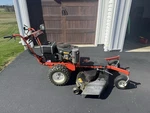 Dr All-terrain Walk-behind Lawn Mower 15 Hp 42 Rotary Blade With Attachments. Fixed Price $3000.00.