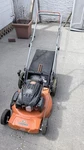 Yardmax YG1650 Walk-behind Lawn Mower Easy Start Gasoline Rotary Orange W/ Bag. Fixed Price $170.00.
