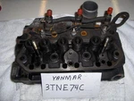 Yanmar 3TNE74C Cylinder Head, Fits Dixie Chopper XXWD2600. Fixed Price $400.00.