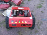 Crawler Lawn Mower Egn Model EG750 Remote Controlled. Fixed Price $3000.00.