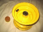 John Deere Front Wheel 6 3/4" X 5 1/4" With Bearings. Fixed Price $34.95.
