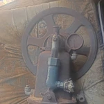 Montgomery Ward Stationary Horizontal Gas Engine W/ Large Flywheel & Gauge. Fixed Price $100.00.