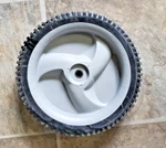 Jonsered/husqvarna L2621 -588405002 Wheel Asm. Idler 11" X 1.75" (used). Fixed Price $15.00.