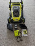 Ryobi RY401260VNM 40V Brushless Cordless 20" Self Propelled Lawn Mower. Fixed Price $450.50.