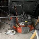 Husqvarna 7021P Walk-behind Gas Rotary Blade Lawn Mower Orange. Fixed Price $300.00.