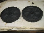 21" Snapper Push Lawn Mower Pair Of 11" Rear Plastic Wheels. Fixed Price $24.99.