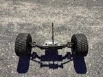 Ryobi RM480EX 48V Riding Mower Complete Axle Steering Assembly. Fixed Price $300.00.